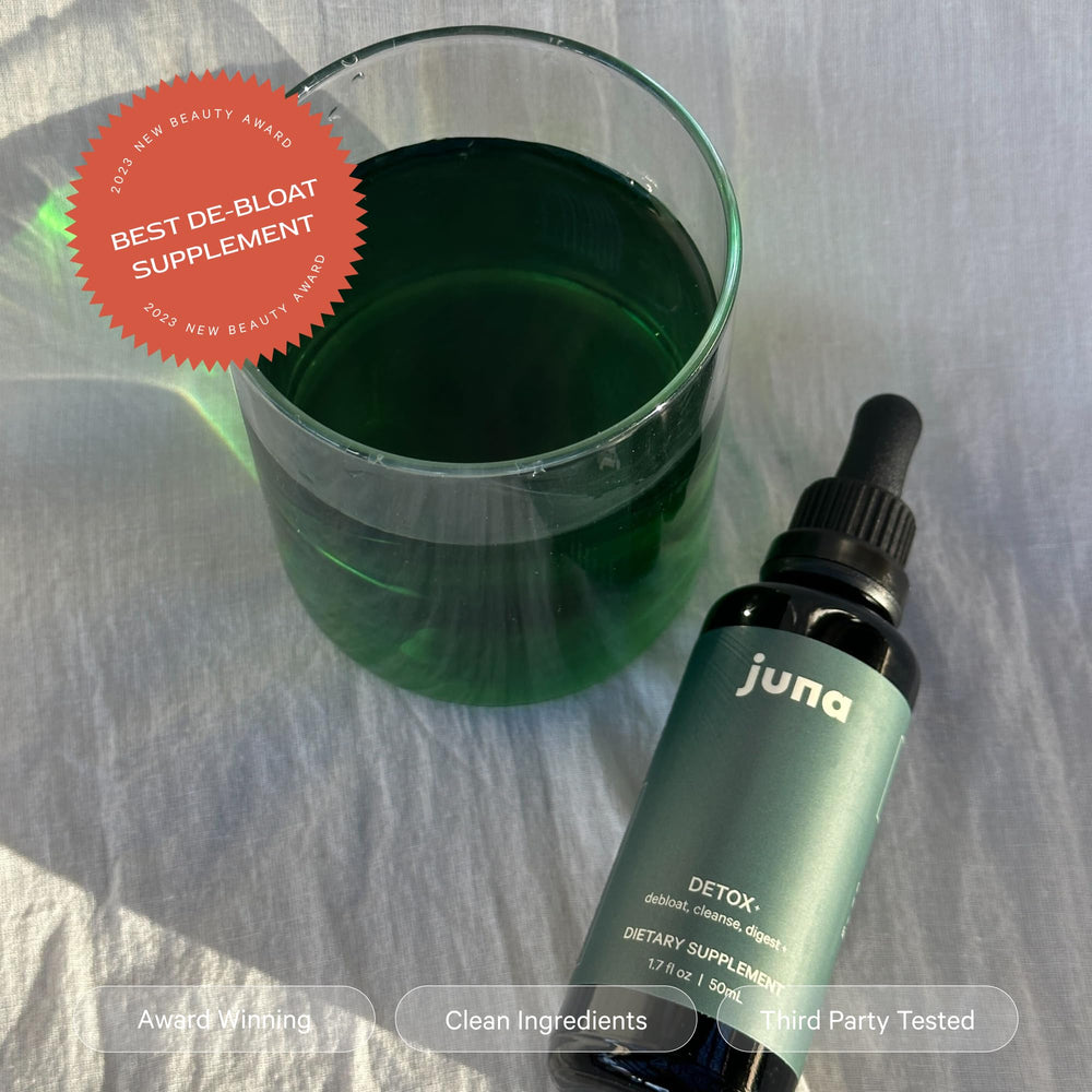 Serving Juna Chlorophyll Drops in a glass of water