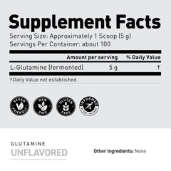 L-Glutamine powder being scooped from a container