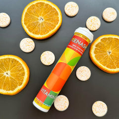 Product shot of Kenashi Vitamin C effervescent tablets with a glass