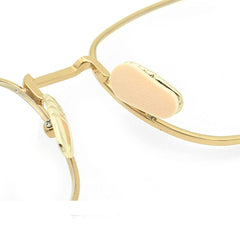 Close-up of khaki foam nose pads with adhesive backing