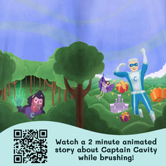 Child brushing with Captain Cavity and Princess Pearly Whites toys