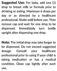 Baby bottle being used with lactase drops added to milk or formula