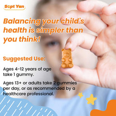 Child taking a gummy with caregiver