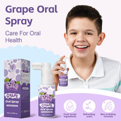 Applying Kids Oral Spray to teeth and gums