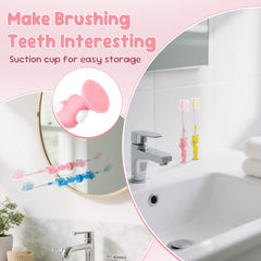 Toothbrush with suction cup base standing on a smooth surface