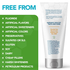 Child brushing with orange-flavored fluoride-free toothpaste