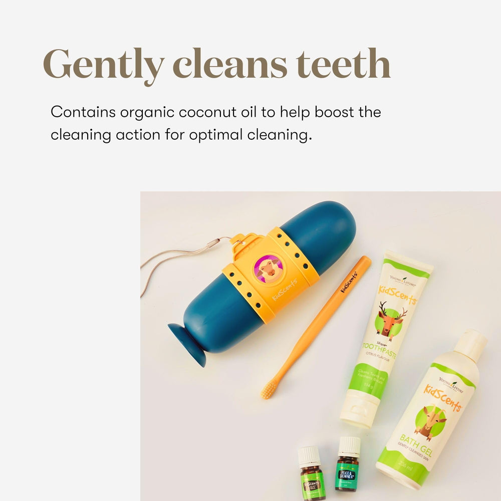 Child brushing teeth with KidScents Slique Toothpaste