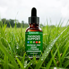 Glass of water with Kindled Thyroid Support Drops being prepared