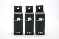 Close-up of bamboo charcoal floss with grapefruit seed extract and mint