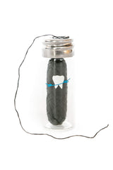 Refillable glass jar dispenser for Knotty Floss