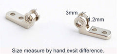 Close-up of silver metal glasses hinges for plastic frames, eyeglasses, and sunglasses