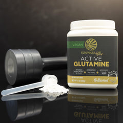 L-Glutamine supplement bottle and scoop