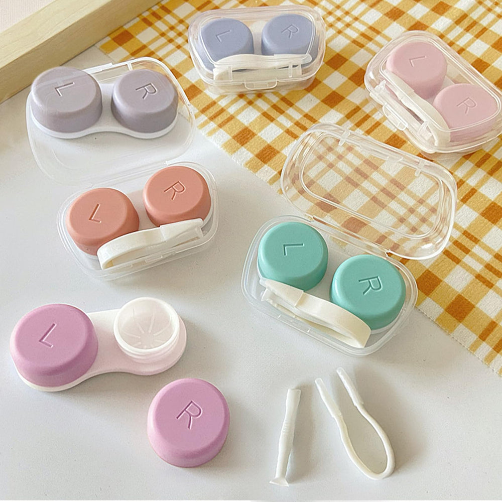 Portable slim contact lens case with secure snap-lock lid and transparent shell
