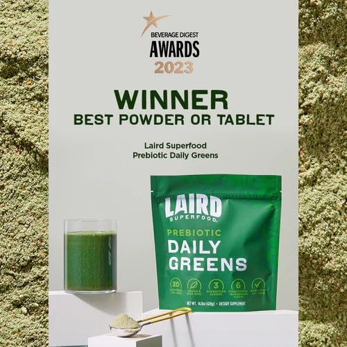 Pouring the daily greens powder into a shaker