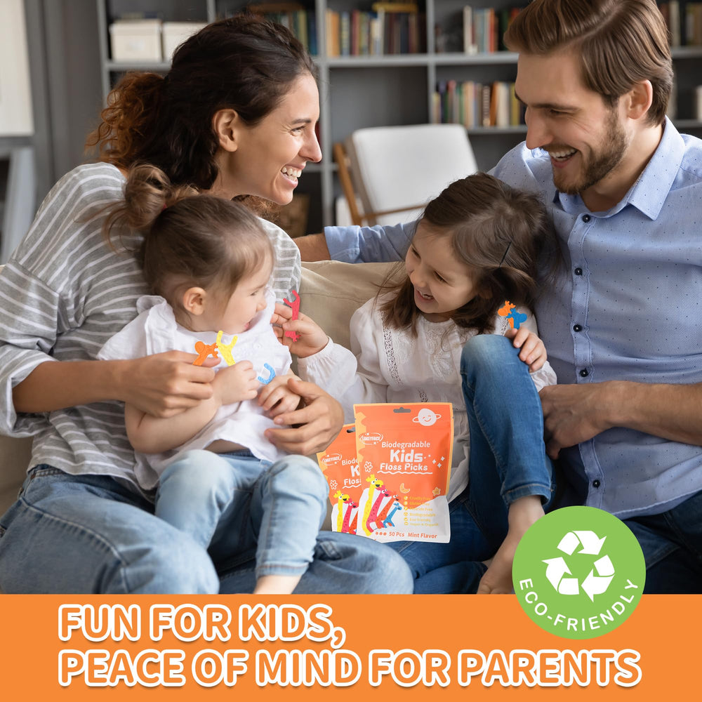 Giraffe-shaped floss picks in use by a child with safe rounded ends