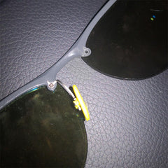 Close-up of replacement nose pads on glasses