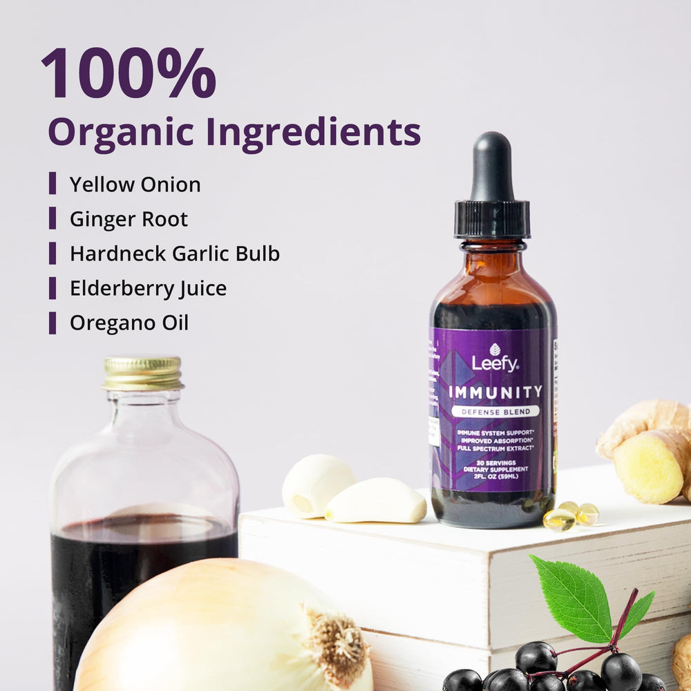 Ingredients collage featuring elderberry, garlic, onion, ginger, and oregano oil