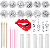 480 white crystal tooth gems arranged in 12 clear round boxes