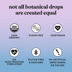 Dropper dispensing sea moss liquid into a glass