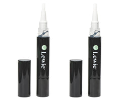 Whitening pen being applied to teeth