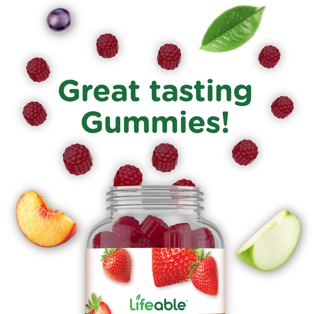 Gummies with fresh strawberries to emphasize flavor