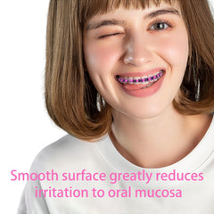 Lightweight clip-on braces being compared on teeth