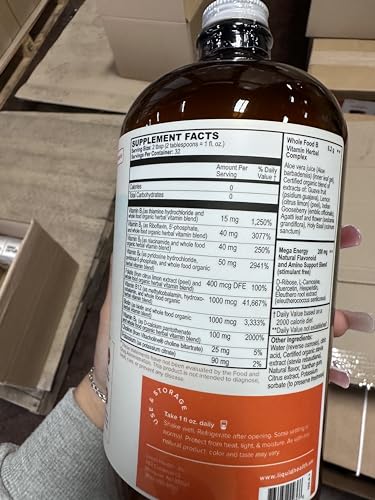 Athlete preparing a drink with Mega Energy B-Complex