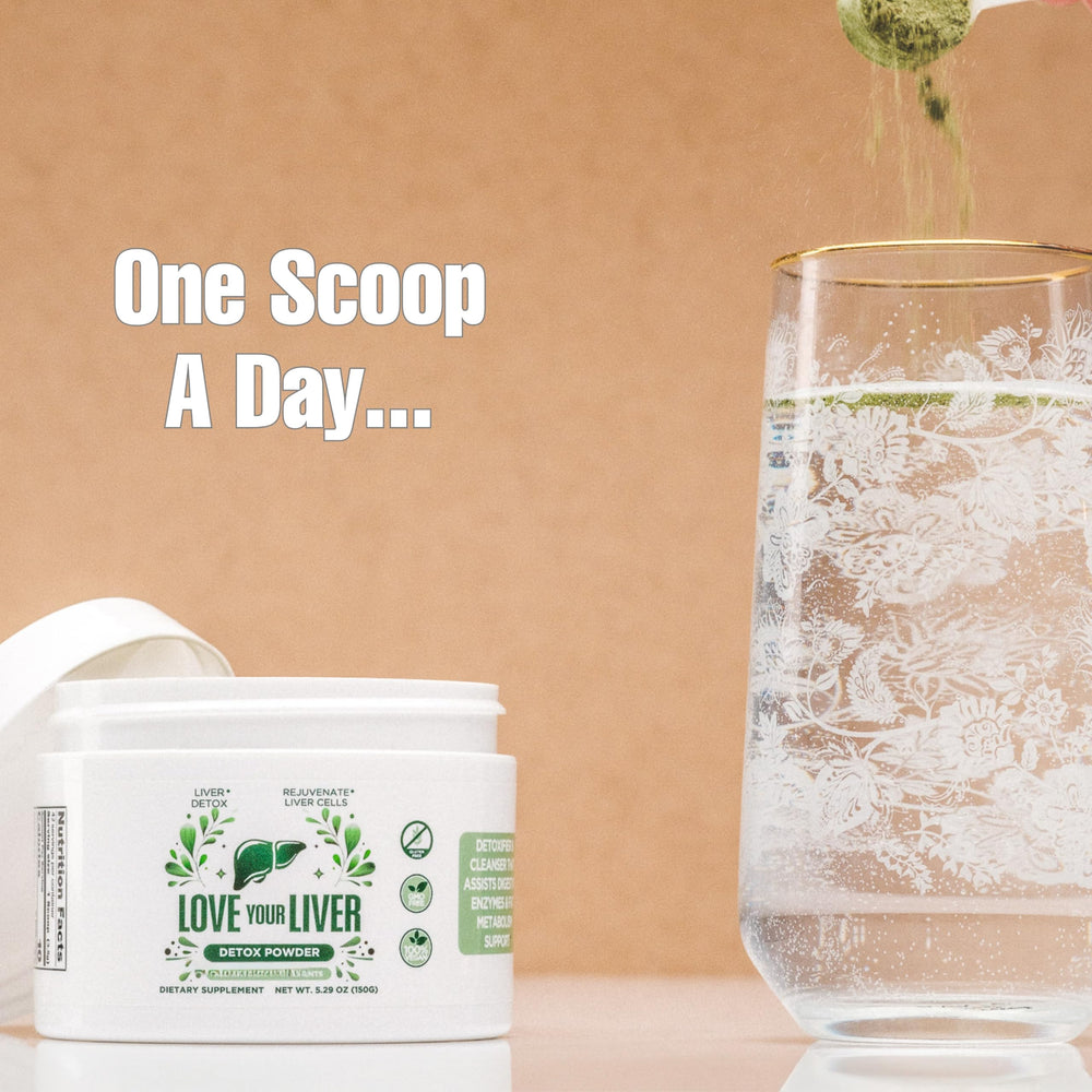 Liver detox powder being stirred into a glass of water