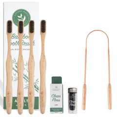 Living Well set front view: bamboo toothbrush, floss, copper tongue scraper with travel bag