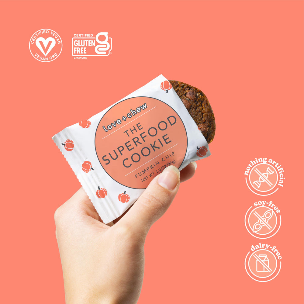 Love + Chew mini cookie texture bite shot showing soft-baked crumb and chocolate chips.