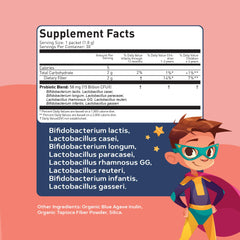 Smiling toddler holding Lovebug probiotic powder box