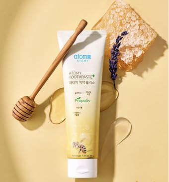 Close-up of toothpaste tube with propolis, xylitol, and green tea extract