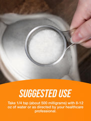 Close-up of L-Tryptophan powder texture with scoop