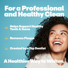 Person brushing teeth with Lumineux Complete Care toothpaste