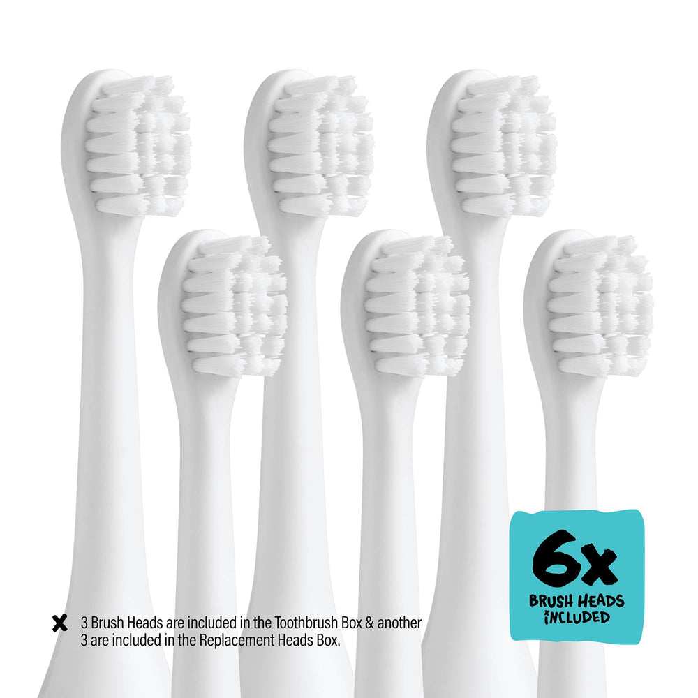 Group of children brushing teeth with shark toothbrush