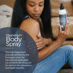 Close-up of applying magnesium spray to feet