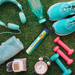 Tablet dropping into a glass of water dissolving