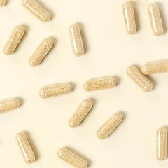 Final product shot with bottle and capsules nearby