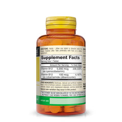 Close-up of raspberry-flavored B12 sublingual tablet dissolving