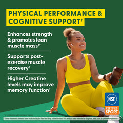 Scoop of creatine monohydrate with 500 g tub