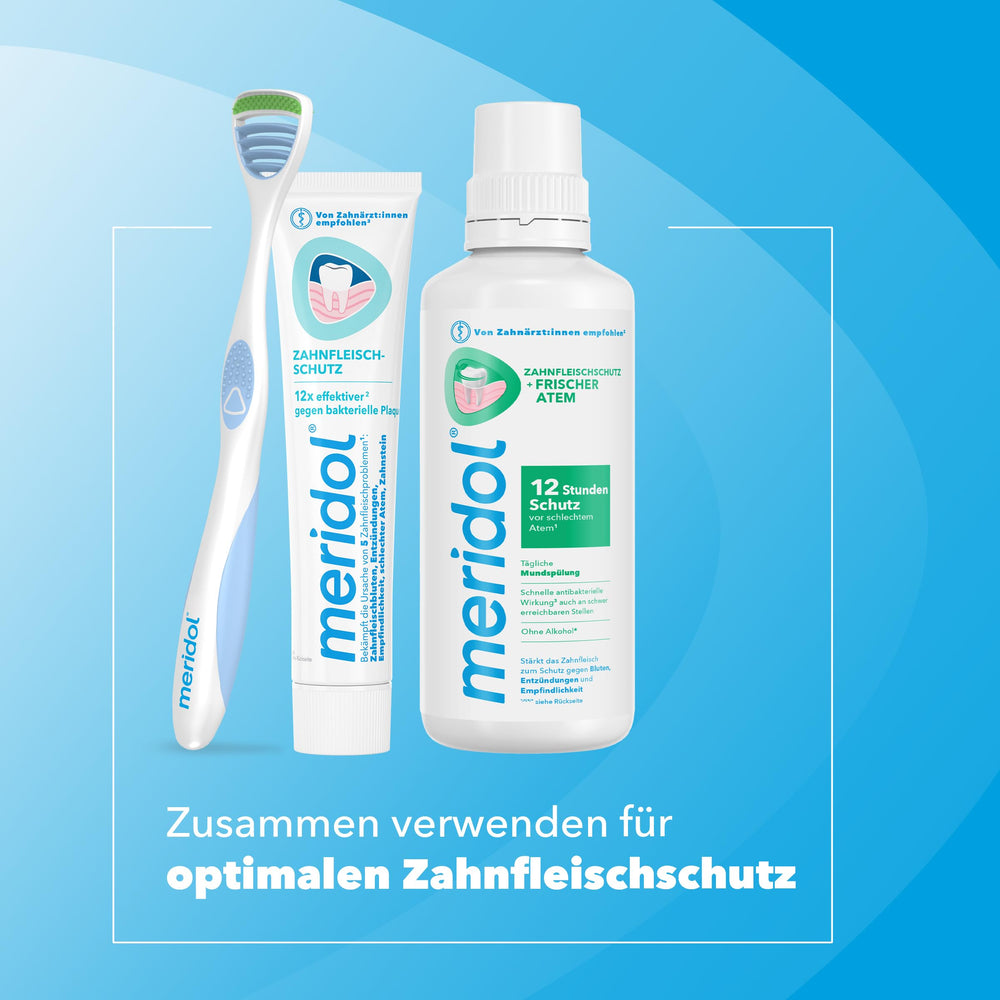 Tongue cleaner shown with toothpaste for scale