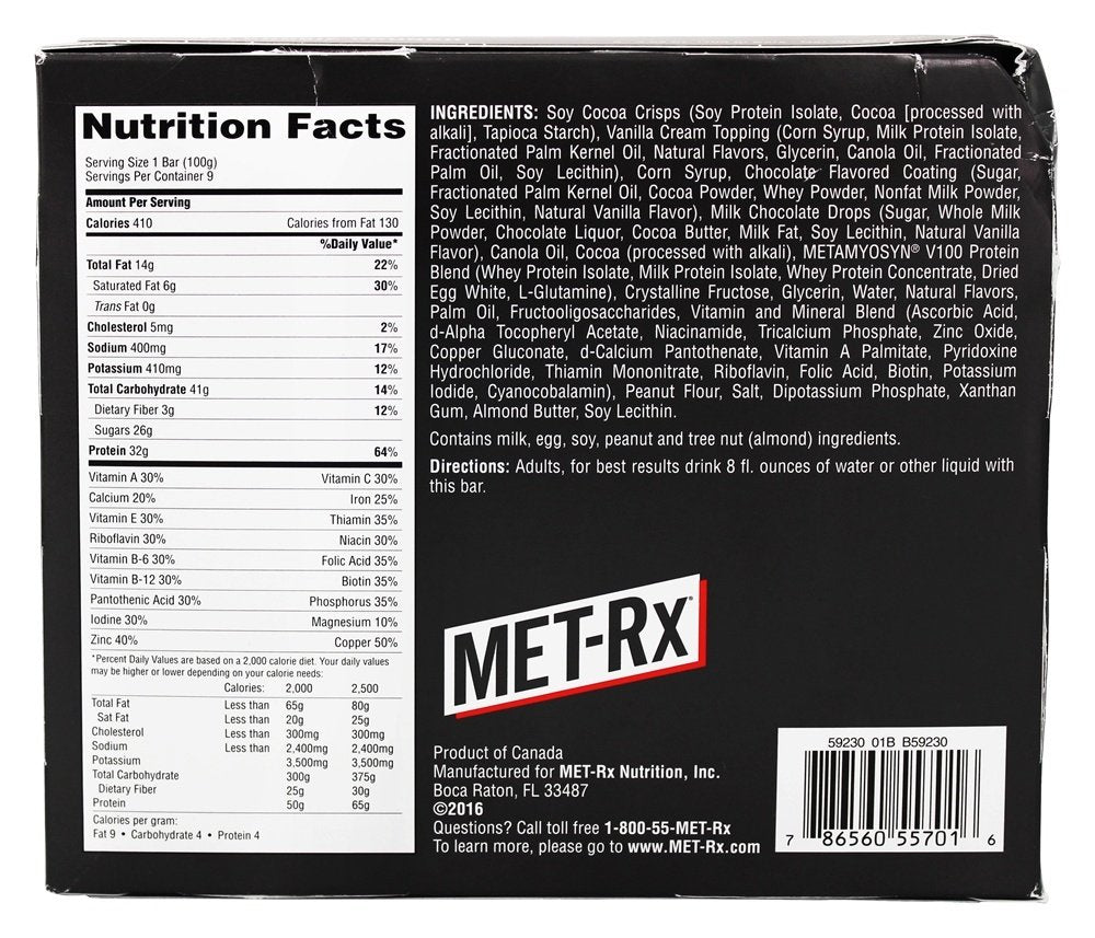 MET-Rx Colossal Cookie Crunch bar unwrap close-up shows cookie-crunch texture.