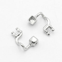 Metal nose pads and pad holder for glasses