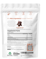 Close-up of three golden pumpkin seed oil softgels