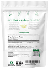 Close-up of Vitamin E 400IU softgels in bottle