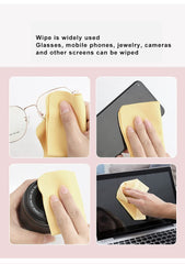 Person using grey microfiber cleaning cloth on a screen