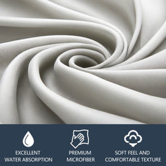 Microfiber cloth cleaning a camera lens