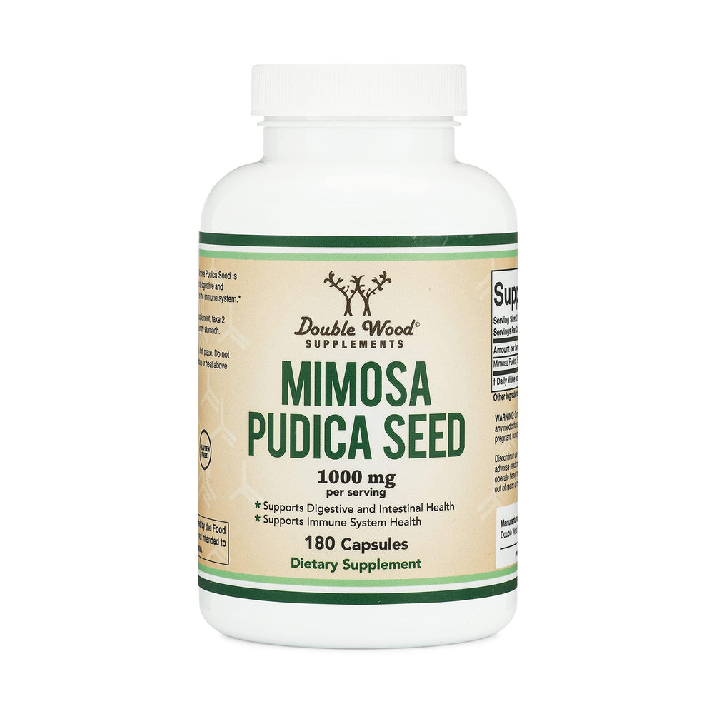 Lifestyle: person taking Mimosa Pudica Seed Capsules with water
