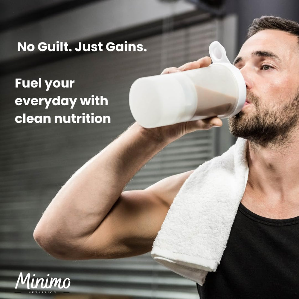 Minimo Nutrition Whey Isolate Vanilla scoop beside a glass signals smoothie integration