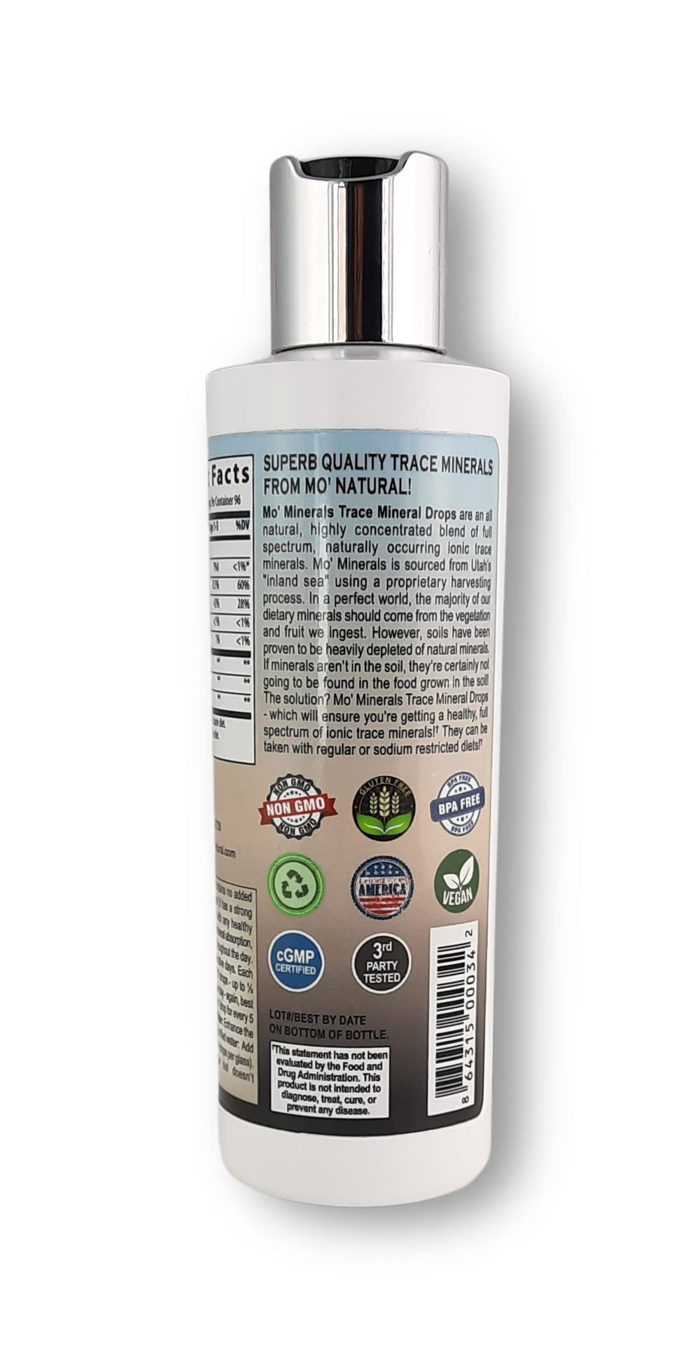 Mo' Minerals bottle pouring drops into a glass